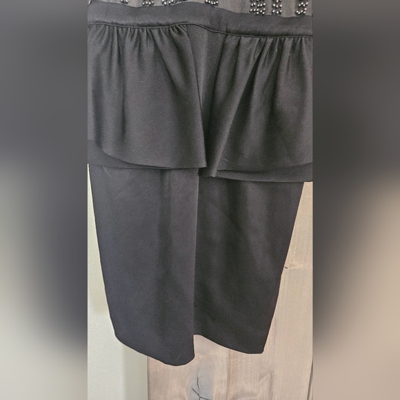 BEBE 90s Beaded top peplum mini dress. Size small - Picture 5 of 11